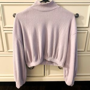 Cute purple, crop sweater with puff sleeves.